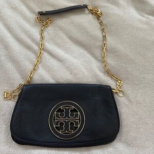 Black with gold hardware Tory Burch crossbody and clutch